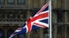 U.K. – The flag of Great Britain and the flag of Ukraine fly in front of the Houses of Parliament on Ukraine Independence Day in London, August 24, 2022